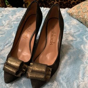 Black suede, pointy toe wedge pumps with gold bows